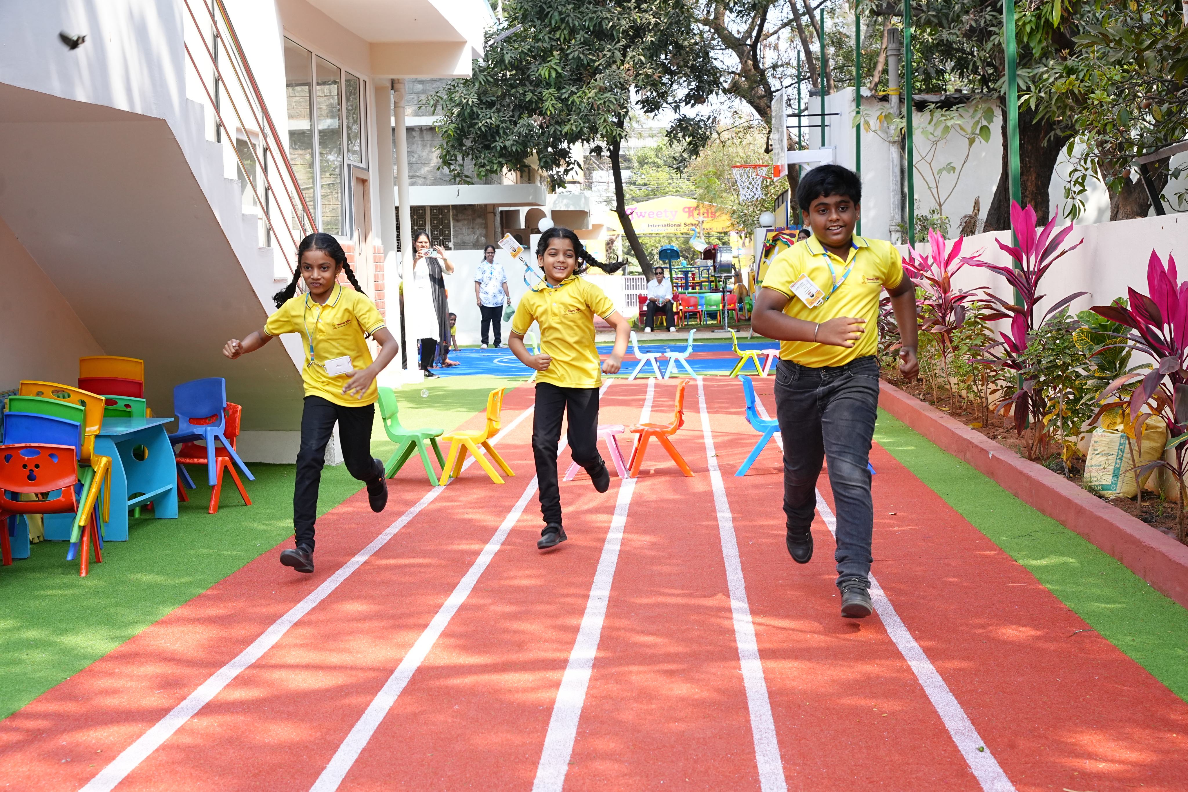 Students running on school track